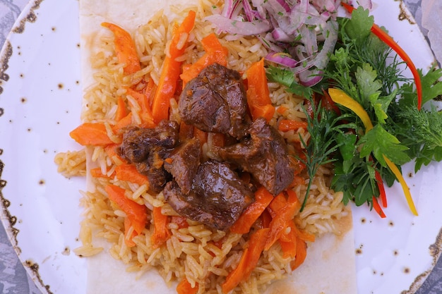 pilaf is a national Uzbek dish made of rice with meat and vegetables