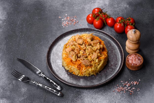 Pilaf or pilau with chicken traditional uzbek hot dish of boiled rice and chicken meat