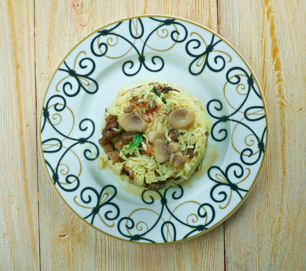 pilaf with mushrooms, tomatoes and walnuts