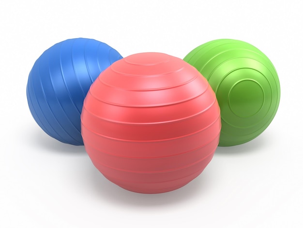 Photo pilates blue green red ball render (isolated on white and clipping path)