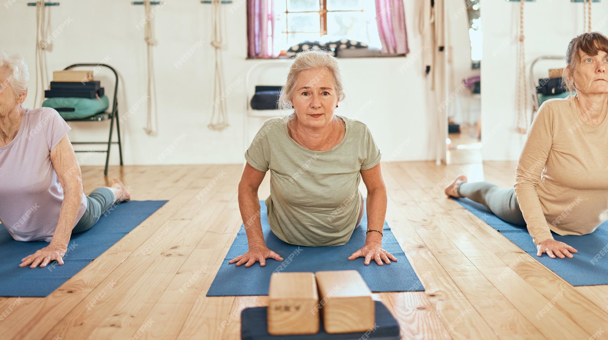 Premium Photo | Pilates studio and senior friends doing a stretching  exercise for health wellness and fitness meditation zen and elderly women  doing a yoga workout for mind body and spiritual balance