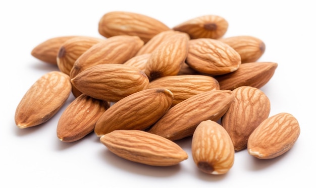 A pile of almonds on a white background