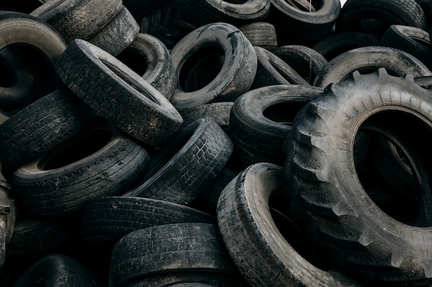 Pile of big used tires at a dump