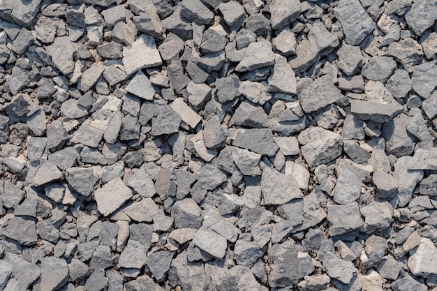 A pile of black rocks and pebbles