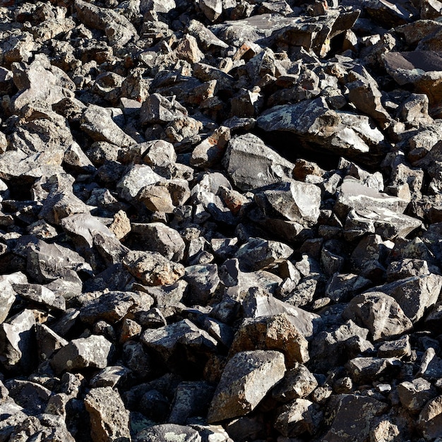 A pile of black stones of volcanic origin. North Caucasus.