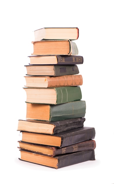 Pile of books isolated on white background.