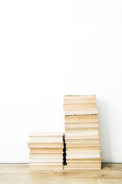 Pile of books on white surface