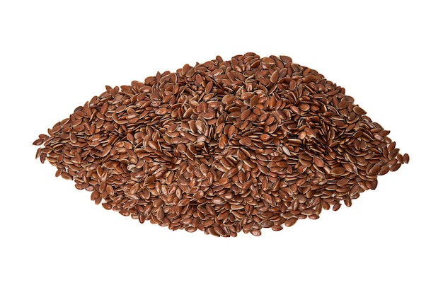 pile of brown flax seeds isolated on white background