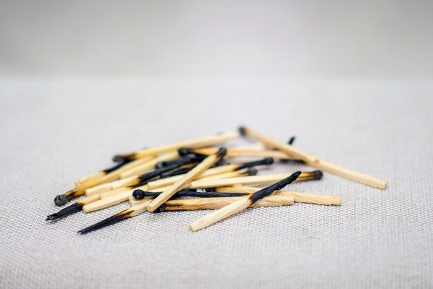 Pile of burned matches closeup