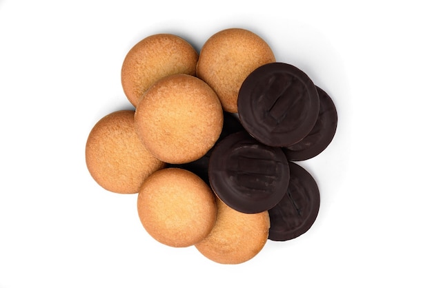 Pile of chocolate biscuit cookies with orange jam isolated on white background.