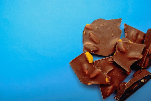 A pile of chocolates on a blue background