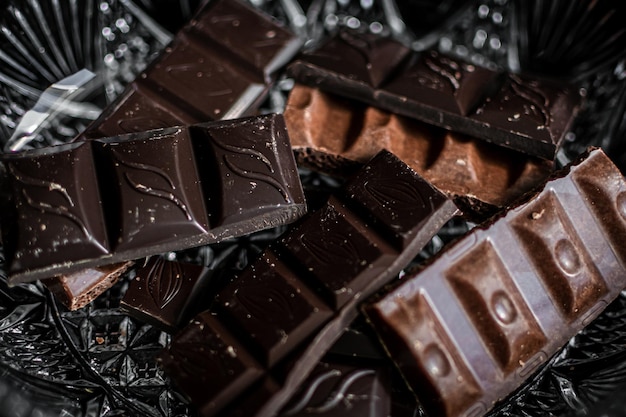 A pile of chocolates with the word chocolate on it