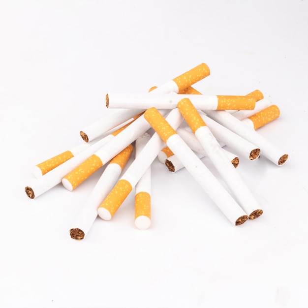 Pile of cigarettes isolated on white background