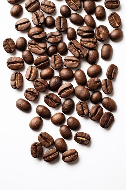 a pile of coffee beans with a white background