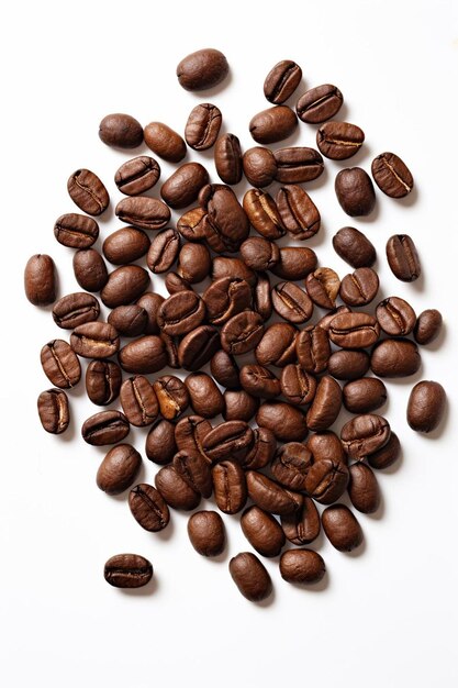 a pile of coffee beans with a white background