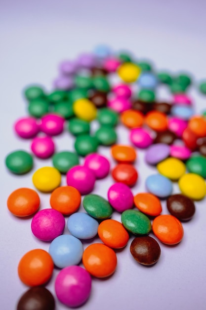 A pile of colorful candy with the word candy on it