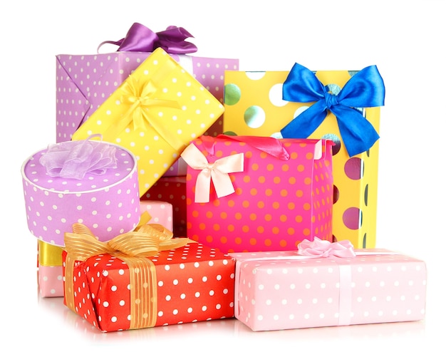 Photo pile of colorful gifts boxes isolated on white