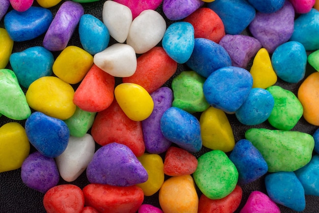 Pile of colorful pebbles as a stone background