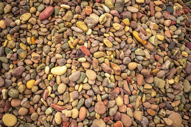 A pile of colorful pebbles is shown.