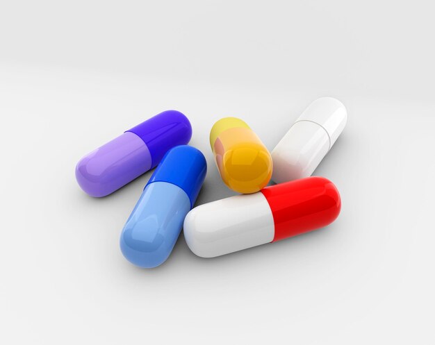 Photo pile of colorful pills tablets and capsules on a white background
