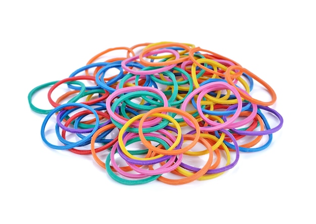 Pile of colorful rubber bands isolated on white.