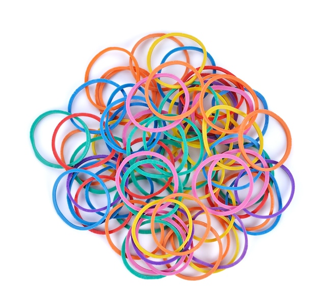 Photo pile of colorful rubber bands isolated on white.