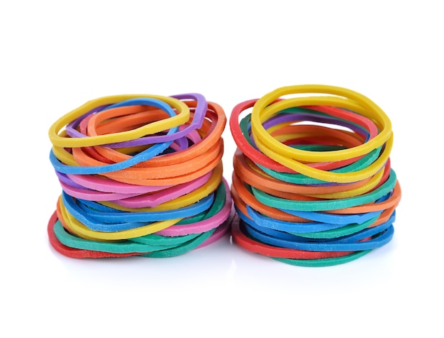 Pile of colorful rubber bands isolated on white.