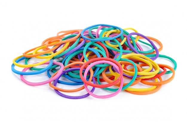 Pile of colorful rubber bands isolated on white.