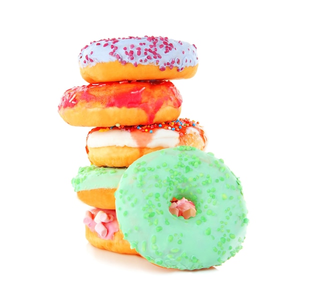 Pile of colourful delicious doughnuts isolated on white