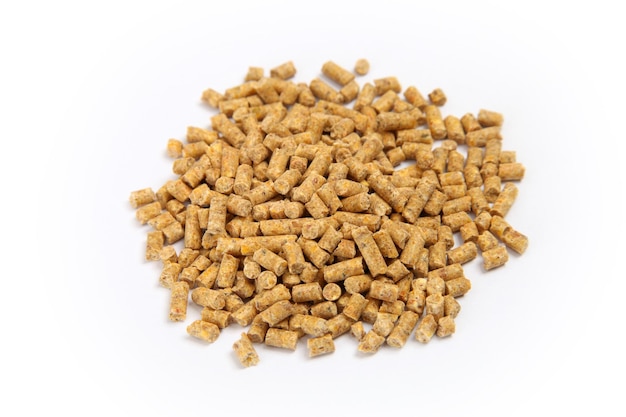 Pile of compound feed pellets isolated on white Animal feed