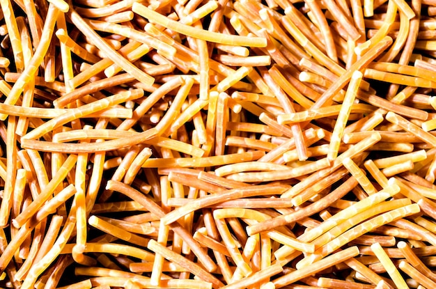 Pile of cooked polyphosphate noodles.