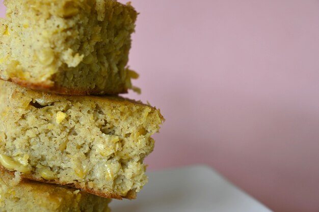 Pile of corn bread pieces, select focus and copy space