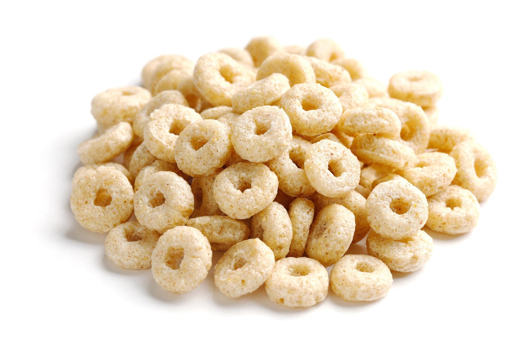 Premium Photo Pile of cornflakes rings for breakfast isolated on white