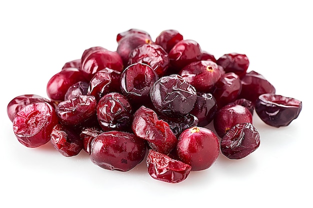 A pile of cranberries on a white surface