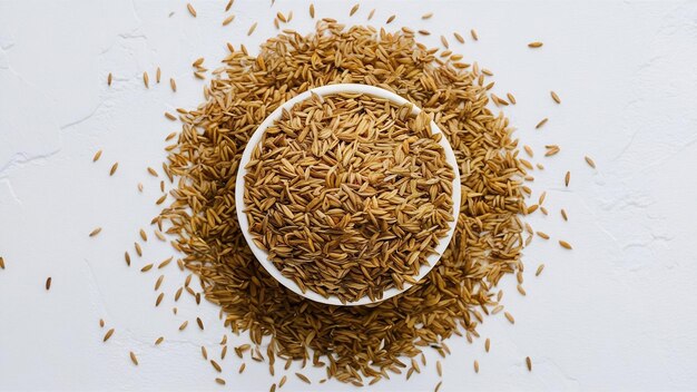 Pile of cumin seeds isolated on white background top view still life copy space flat lay