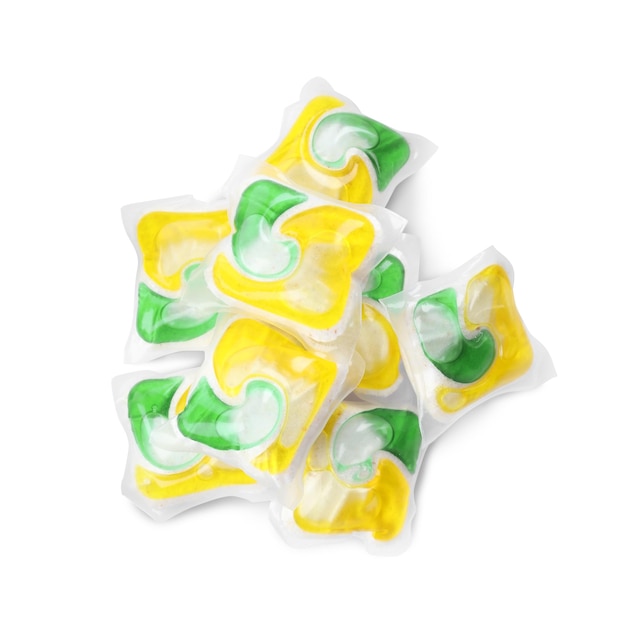 Pile of dishwasher detergent pods on white background top view