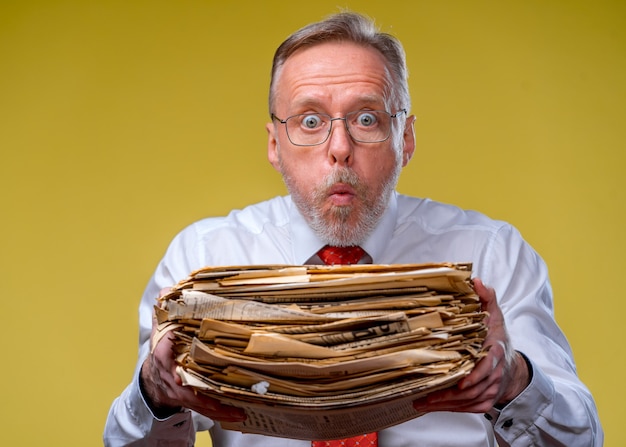 Pile of documents in hands