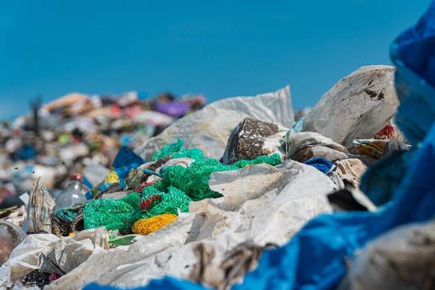 Pile of domestic garbage in landfill close up Environmental pollution Soft focus