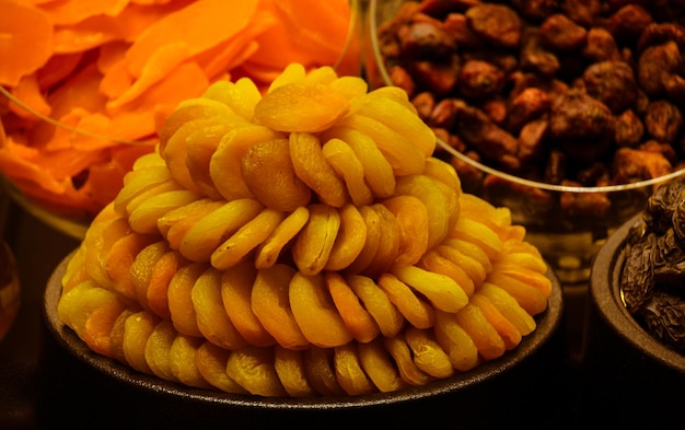 Foto mucchio di fondo di albicocca nutrizione sana secca nel mercato della frutta