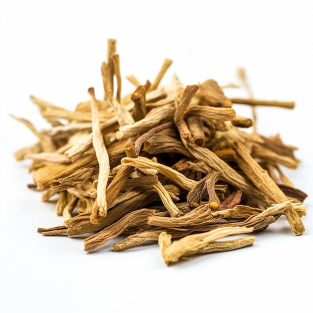 A pile of dried tea leaves sits on a white background.