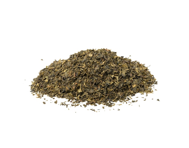 Pile of dry green tea isolated, close up