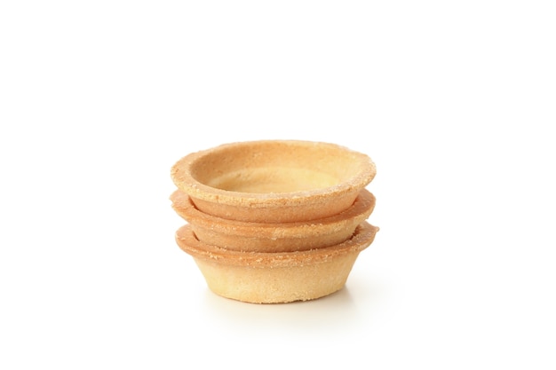 Pile of empty tartlets isolated on white