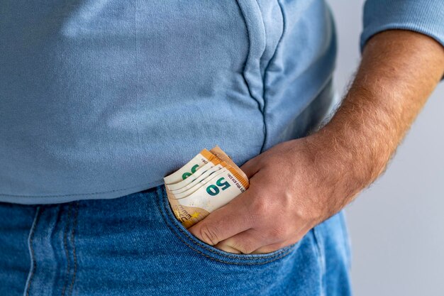 Pile of euro banknotes in pocket