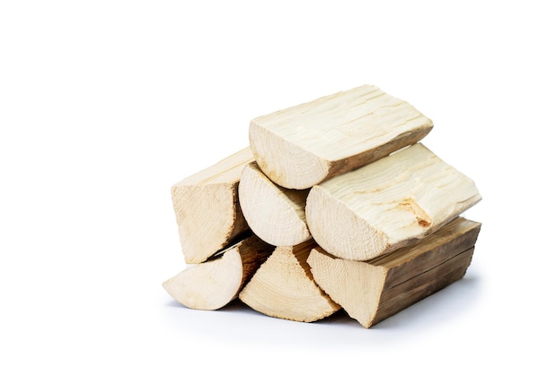 Pile of firewood isolated on white chopped wood for kindling and heating the house