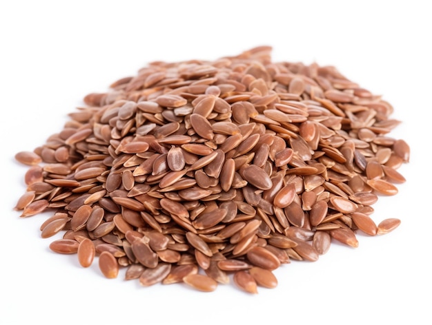 A pile of flax seeds on a white background