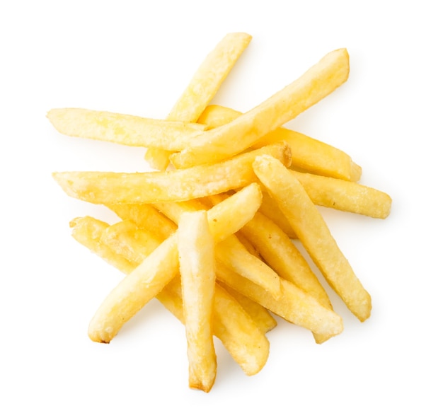 Pile of French fries on a white background, isolated. Top view.