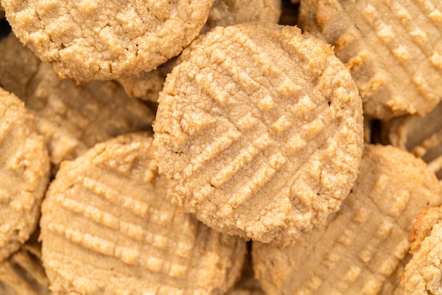 Pile of freshly baked peanut butter cookies.