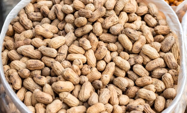 A pile of fried peanuts on a polybag