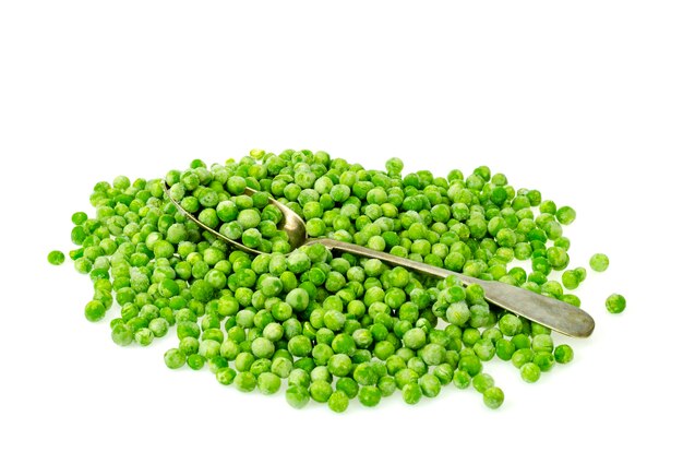 Pile of frozen blanched green peas isolated on white surface
