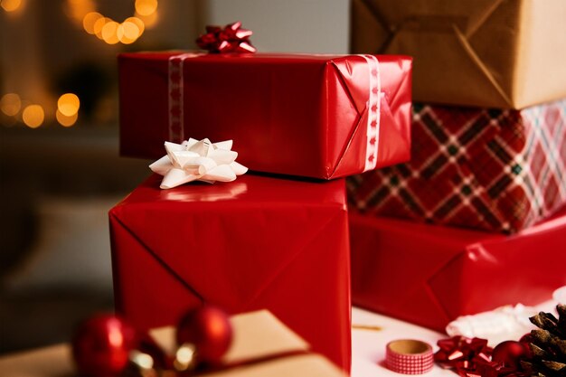 Pile of gift boxes wrapping in craft paper on table